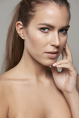 Image showing Skincare, beauty and serious portrait of woman in studio for wellness, facial treatment and self care. Face, spa and female person with natural cosmetics, makeup and dermatology on gray background