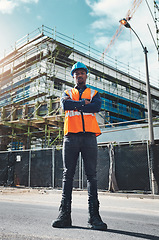 Image showing Construction, engineer man and portrait at building project for development and architecture. Black male contractor serious about project management, engineering and inspection outdoor in city