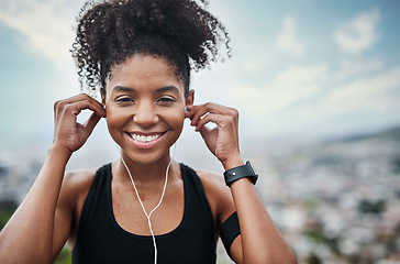 Image showing Fitness, earphones and portrait of woman outdoor with music for training, running or cardio. Radio, smile and face of African female runner with podcast for workout motivation, exercise and sport run