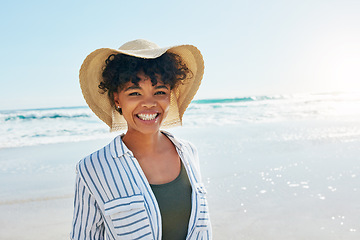 Image showing Woman, face portrait and summer at the beach for a vacation, travel or holiday with a smile. African female person at sea with happiness, freedom and positive mindset to relax outdoor