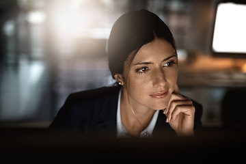 Image showing Thinking, overtime and woman in office reading email, proposal or problem solving at start up agency. Corporate night work, ideas and time management, business worker at desk working on online report