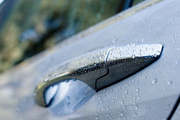 Image showing Wet car door