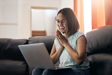 Image showing Home, excited and woman with a laptop, couch and happiness with website launch, connection and joy. Female person, girl or freelancer on a sofa, pc or technology with announcement, internet and email