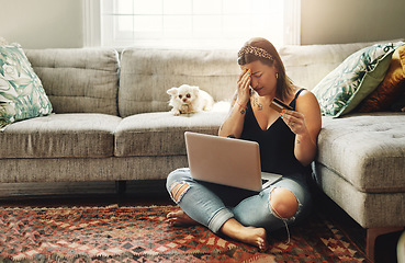 Image showing Laptop, credit card and woman stress, anxiety or depression for home loan, payment debt or fintech problem on floor. Headache, sad and depressed person with dog on computer, banking scam or mistake