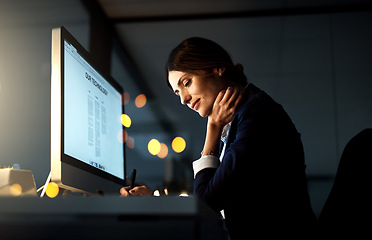 Image showing Focus, desktop and businesswoman at night or employee in the office or thinking with pen. Corporate, dark and female manager contemplate or computer and stationery in the evening at workplace