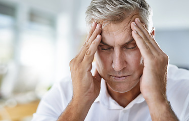 Image showing Headache, stress and mature businessman in the office with healthcare problem or medical emergency. Medical issue, burnout and sick professional corporate manager in pain with a migraine in workplace