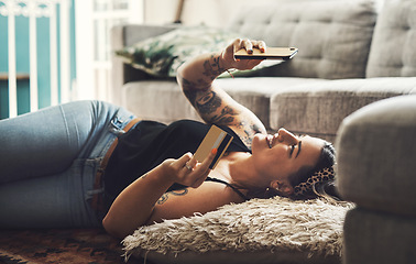 Image showing Woman, credit card and phone on floor for online shopping, e commerce and fintech payment, loan or finance at home. Happy person relax on ground, typing and internet banking on mobile app transaction