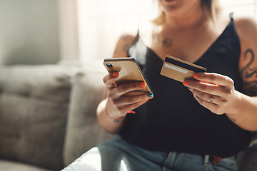 Image showing Phone, credit card and woman hands on sofa for online shopping, e commerce and fintech payment, loan or finance. Person on couch typing banking information on mobile app for home and web transaction