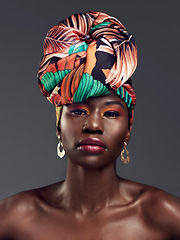 Image showing Portrait, head wrap and black woman with beauty, makeup and confident model on a grey studio background. Face, female person and girl with traditional turban, cosmetics and fashion with elegance