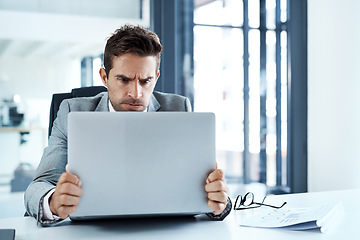 Image showing Stress, angry and man on laptop in office frustrated with glitch, mistake or crisis. Anxiety, annoyed and male business person upset with fail, 404 and bad review, deadline report or tech problem