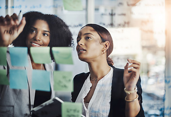 Image showing Writing, schedule and meeting by business women planning agenda or calendar and sticky note in office. Teamwork, management and female person team collaboration for solution, strategy and mission