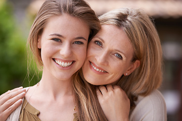 Image showing Smile, hug and portrait of a mother and daughter with happiness, love and care in a garden. Parents, family and a mature mom hugging a happy woman for affection, content and together in a backyard