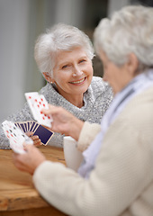 Image showing Happy, game and portrait of old people playing cards for happiness and enjoyment in a nursing home. Smile, hobby and content senior women together for poker, card games and relaxing in retirement