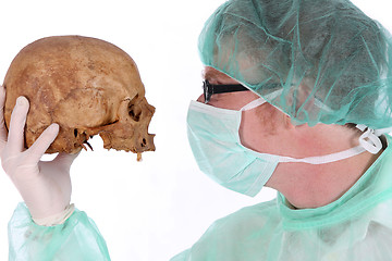 Image showing surgeon with skull