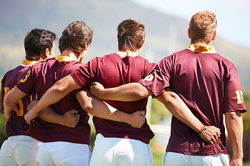 Image showing Back, rugby team and sports with men in a line outdoor on a field before a game or competition in summer. Teamwork, sport and unity with male athletes or players getting ready for training or a match