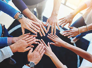 Image showing Business staff, hands together and office worker group with support, motivation and solidarity goal. Above, hand in and success of teamwork and people with workplace community and achievement