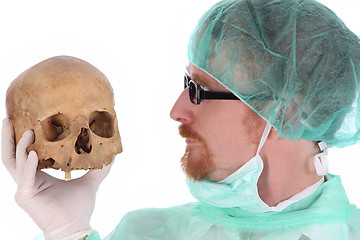 Image showing surgeon with skull