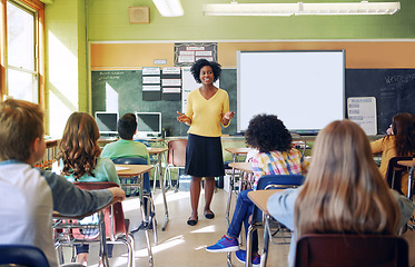 Image showing Education, school and a teacher black woman in a classroom with student children for learning. Scholarship, study and child development with African female educator teaching kids during class lesson