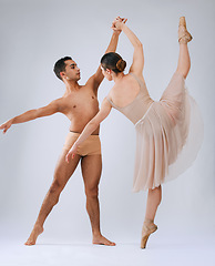 Image showing .Ballet dancing couple, studio and holding hands for balance, finesse and art movement for beauty in class. Young dancer team, performance or man with woman in class for fitness, teamwork and focus.