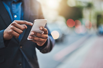 Image showing Business, phone and hands of man in city for networking, online website and social media contact. Communication, mobile app and male person on smartphone for email, research and travel gps in street