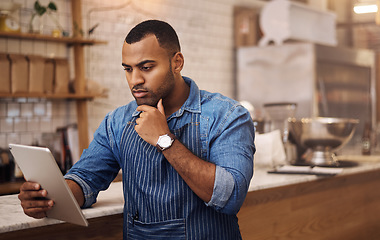 Image showing Thinking, tablet and manager with man in cafe for online, entrepreneurship and startup. Retail, technology and food industry with small business owner in restaurant for African barista in coffee shop