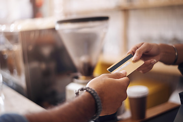 Image showing Credit card, cashier and hands of customer in cafe for payment, financial transaction and point of sales service. Closeup of finance, trade and bills to barista in coffee shop, b2c offer and shopping