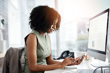 Image showing Phone, computer screen and woman typing for online networking, multimedia management and marketing. Research, scroll and african person at office desktop pc and mobile app on chat, website or reading