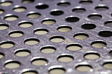 Image showing Aluminum sheet drilling small holes.The surface of the material is drilled into small holes.dots wallpaper.abstract metal background with holes.