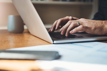 Image showing Hands, closeup and man with laptop in home office for finance, review or budget planning. Fingers, keyboard and male person paying bills online for savings, investment and mortgage or startup loan