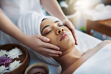 Image showing Woman, hands and face massage for skincare, relax or beauty spa treatment on bed at resort. Calm female relaxing with eyes closed or resting for physical therapy, healthy wellness or cosmetic facial