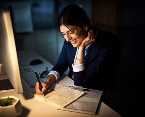 Image showing Book, smile and businesswoman or writing at night or planning and pc in an office. Corporate, dark and female worker or project manager in the evening or company note and dedicated on computer