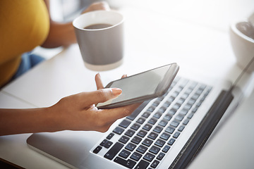 Image showing Woman, hands and phone at a laptop for work networking and employee typing. Female worker, table and social network app with mobile communication and text for professional and web connection