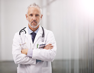 Image showing Doctor, healthcare and portrait of a serious man in a hospital with mockup space for health insurance. Professional male medical worker with a stethoscope for a consultation, healing and wellness