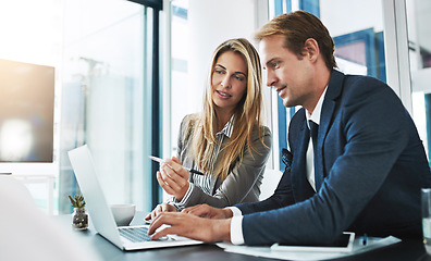 Image showing Man, woman and partnership with research, laptop and typing with help, explain and coaching in workplace. Businessman, female partner and computer for business goal, teamwork or training at job