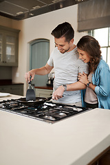 Image showing Love, breakfast and cooking with couple in kitchen and hugging for food, morning and happiness. Smile, care and nutrition with man and woman eating at home for happy, health and hungry together