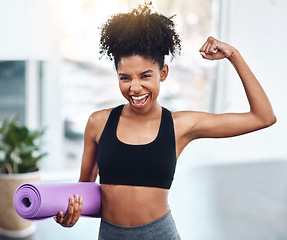 Image showing Black woman, flex and muscle for fitness or portrait of motivated athlete or yoga mat and happy for exercise indoors. Workout, training and girl runner energy or goal for muscle in gym for sports