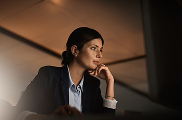 Image showing Problem solving, overtime and thinking, woman in modern office reading email or online report at start up agency. Corporate night work, challenge and focus, businesswoman at desk working late on idea