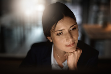 Image showing Thinking, night work and woman in modern office reading email, proposal or problem solving at start up agency. Overtime, ideas and time management, corporate worker at desk working on online report.