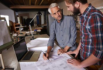 Image showing Architect men, teamwork and planning blueprint with discussion, construction goal or vision in workshop. Senior man, young male partner and paperwork for building, property or real estate development