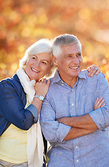 Image showing Senior couple, nature and thinking of future together in autumn, park or vineyard or happy, marriage in retirement or relax, love or happiness. Elderly people, smiling outside in fall countryside