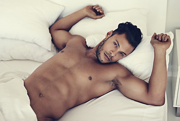 Image showing Portrait, naked and man in a bed in the morning, fitness and muscular at home, serious and confident. Face, male person and guy in the bedroom, muscle and sexy with wellness, nude and shirtless