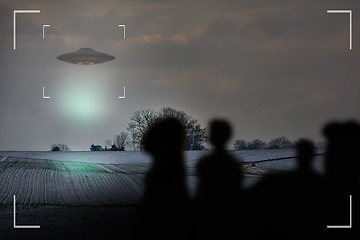 Image showing UFO, alien and camcorder on a camera display to record a flying saucer in the sky over area 51. Viewfinder, sighting and conspiracy with a spaceship on a recording device screen outdoor in nature