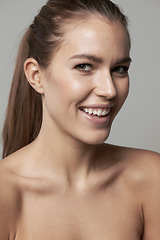 Image showing Happy, beauty and portrait of woman in studio for wellness, facial treatment and self care. Dermatology, skincare and face of female person with natural cosmetics, makeup and smile on gray background