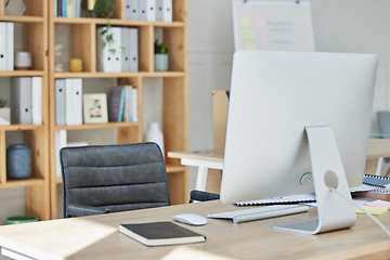 Image showing Empty office, chair and computer on desk in workplace, company or workspace room for business. Corporate furniture, modern interior or wooden table with nobody, notebook or minimal design in agency