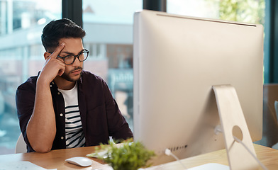 Image showing Business man, bored and thinking at computer desk while online for research with poor internet. Male entrepreneur person tired or frustrated with connection glitch or problem while reading email