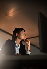 Image showing Thinking, concentration and woman in office at night reading email, proposal or online report at start up agency. Corporate overtime, challenge and focus, businesswoman at desk working late on ideas.