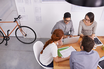 Image showing People in conference room, team at meeting and brainstorming with collaboration and project planning top view. Teamwork, strategy discussion in workplace with young men and women working together