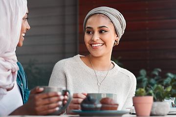 Image showing Friends, coffee and smile with Muslim women in cafe for conversation, food and social. Happy, relax and culture with arabic female customer in restaurant for discussion, happiness and meeting