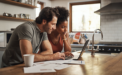 Image showing Laptop, couple and financial planning in a kitchen with documents for budget, savings and paying bills. Interracial, online and people with paperwork for taxes, mortgage and home loan application