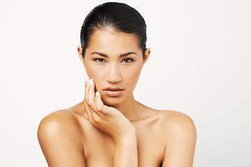 Image showing Beauty care, woman and portrait with skincare and dermatology with mockup. Isolated, white background and young Asian female person with face makeup and skin glow from cosmetics and treatment